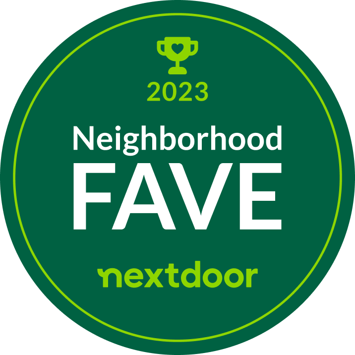 A green circular badge with a yellow outline features the text "2023" and a trophy icon at the top, "Neighborhood FAVE" in the middle, and "nextdoor" at the bottom in green, signifying it as an award for being a favorite neighborhood veterinarian.